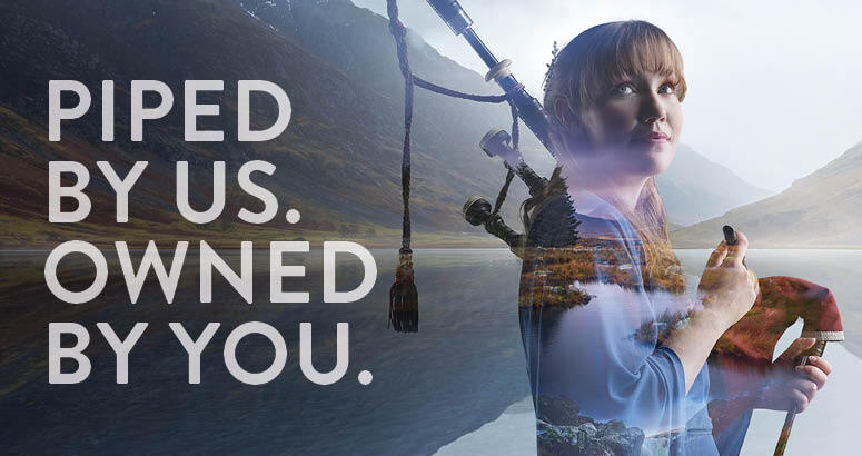 Piped by Us. Owned by You. campaign image showing girl holding bagpipes amidst Scottish scenery