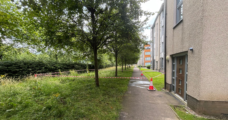 The burst is under a grassy area Kings Inch Road Rising Sewer Main Burst