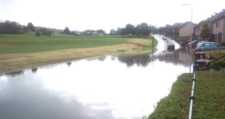 Storm water flooding on St Leonard Place affects residents, the road and part of the park area