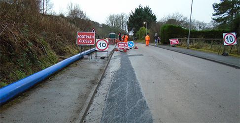laying pipe on McCaig Road laying pipe on McCaig Road
