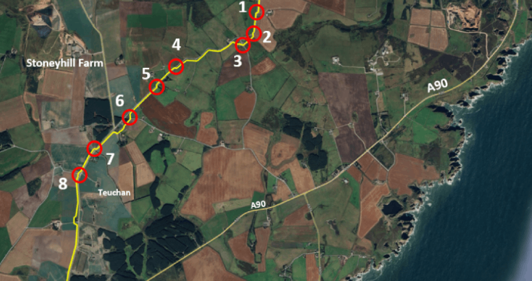 An aerial map image of rural Aberdeenshire showing Stoneyhill Farm. Through the image runs a yellow line denoting the route of a new trunk water main. Red circles and numbers show the location of planned road closures.