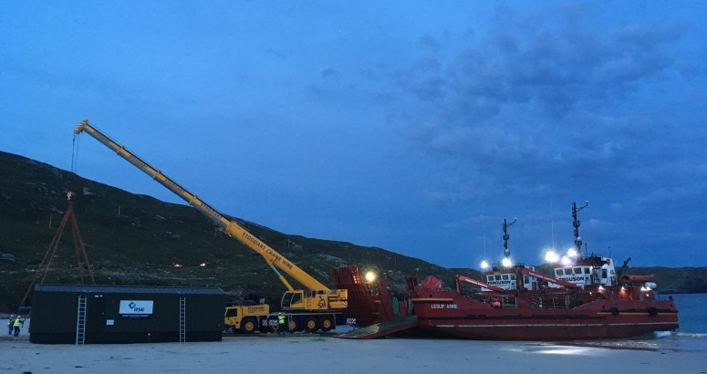 The new Water Treatment Works being unloaded on to Huisinis Beach in North Harris