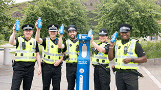 Police Officers at the top up tap