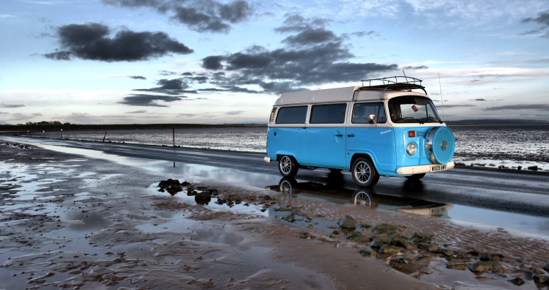 Campervan on coastal road Campervan on coastal road