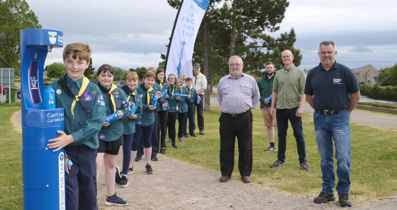 Members of the 1st Nairn Scouts get the town's new Top up Tap flowing with local councillor Tom Heggie, Alex Williamson of Nairn Connects and Stevie Webster from Scottish Water