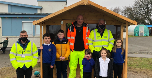 Members of the project team with pupils from Tong Primary and the new