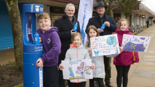 Scottish Water's Chief Operating Officer Peter Farrer joins pupils from Aviemore Primary School and Councillor Bill Lobban to launch the new Top Up Tap