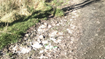 Footpath covered in wet wipes and sewer detritus