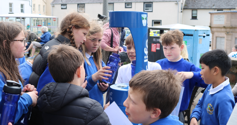 P6 pupils from Portree Primary School in Skye put the town's new Top up Tap through its paces with their new refillable water bottles