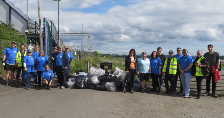 Nature Calls Helensburgh Beach Clean Volunteers with bags of rubbish collected on Craigendoran Beach