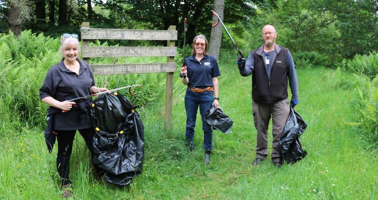 Volunteers from Angus Council and Scottish Water picking litter at Loch of Lintrathen
