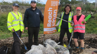 Scottish Water employees taking part in the great british beach clean