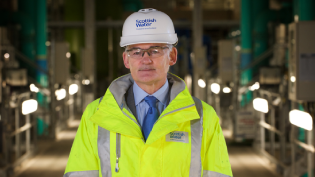 Peter Farrer pictured in PPE