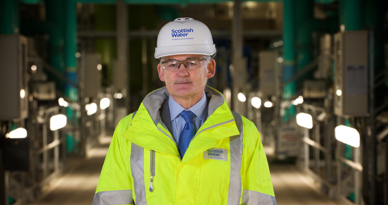 Peter Farrer pictured with PPE on