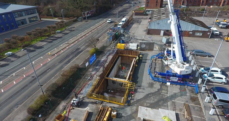 A crane prepares to lift a concrete form into the new CSO chamber A8 Greenock Flood Alleviation Project