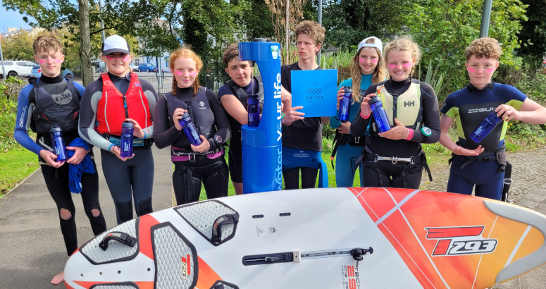 A Group of windsurfers at the Top Up Tap