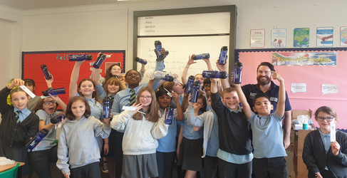 Pupils from Our Lady of the Rosary Primary School with CWA Communications Manager Paul Milligan Paisley TBM Naming Competition