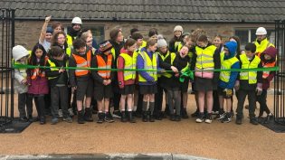 Invergowrie Primary School pupils cutting the ribbon on the improved car park