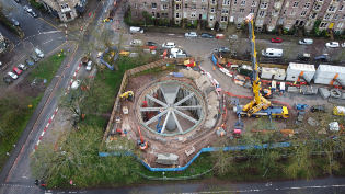 Crane installing roof on new Marchmont storm water tank