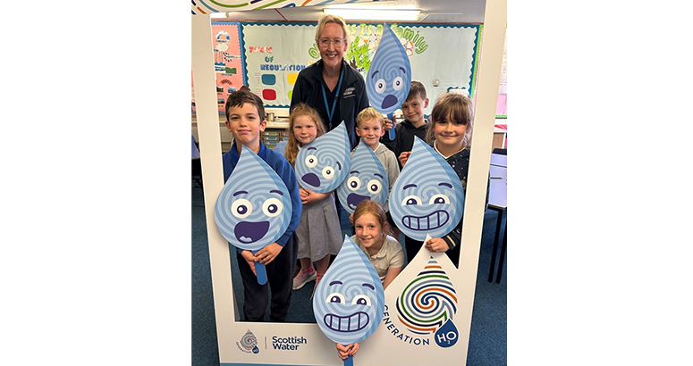 Scottish Water employee with kids at Science Centre