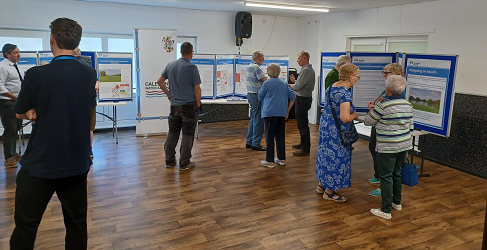 Customers speak to the project team at an Information Event in Montrose