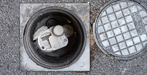 Example of a domestic smart monitor installed in a boundary box on a pavement