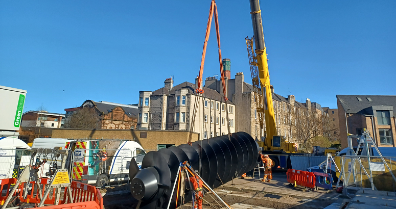 The screw pump is lowered into place
