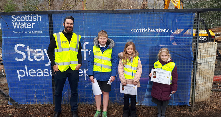 Callander schoolkids presented with wood owl Callander schoolkids presented with wood owl