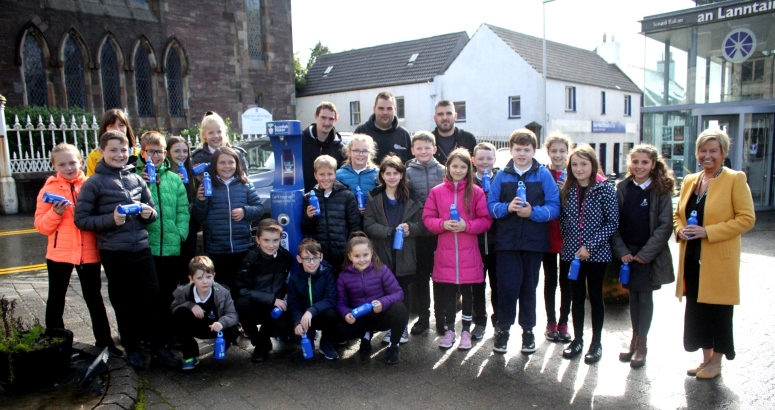 Pupils from Back Primary School pictured with Peat & Diesel at the Top Up Tap