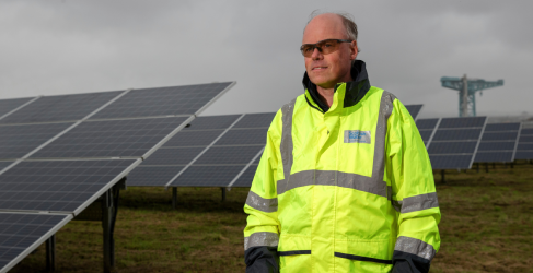 Douglas Millican Chief Executive of Scottish Water pictured outside beside solar panels
